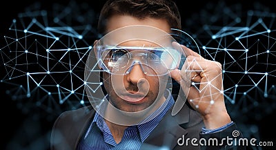 Businessman in virtual reality or 3d glasses Stock Photo