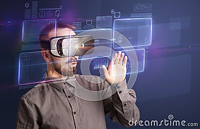 Businessman with virtual reality goggles Stock Photo
