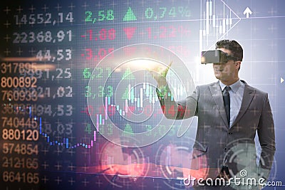 The businessman in virtual reality trading on stock market Stock Photo