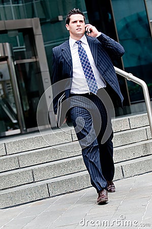 Businessman Walking Stock Photo