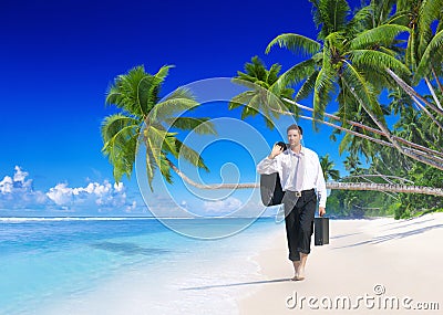 Businessman Walking Along Beach Summer Vacation Concept Stock Photo