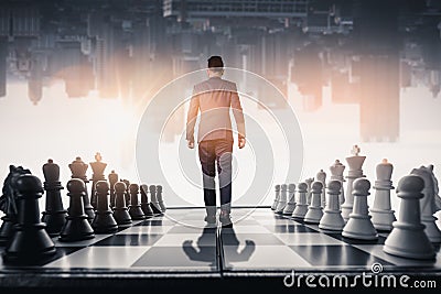 The businessman walking on the chessboard Stock Photo
