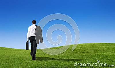 Businessman walking hill Effort Future Concept Stock Photo