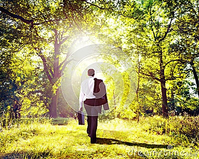 Businessman Walking Outdoors Nature Woods Concept Stock Photo