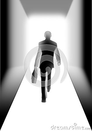 Businessman walking to the light Stock Photo