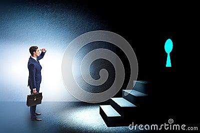 The businessman walking towards keyhole in challenge concept Stock Photo
