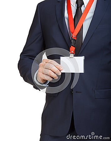 Businessman wearing a blank ID tag or name card on a lanyard at an exhibition or conference Stock Photo