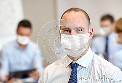 Businessman wearing face protective mask at office Stock Photo