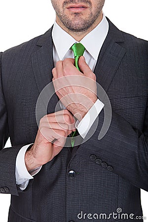 Businessman wearing green tie Stock Photo