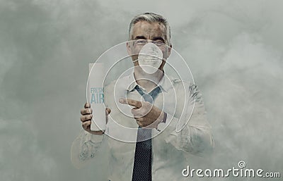 Businessman advertising a spray air purifier Stock Photo