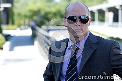 Businessman wearing sunglasses Stock Photo