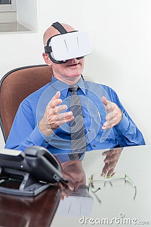 Businessman wearing VR headset, amazed