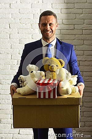 Businessman wears smart suit and tie. Business and volunteering concept. Stock Photo