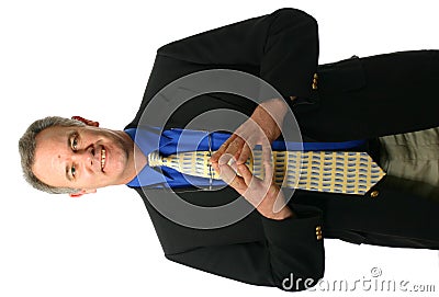 Businessman with welcoming gesture Stock Photo