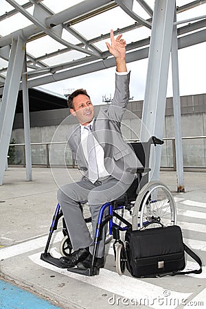 Businessman in wheelchair Stock Photo