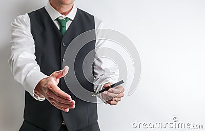 Businessman have hand reached out to handshake. Stock Photo