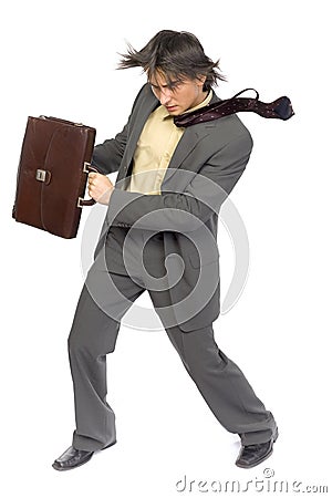 Businessman in the wind Stock Photo