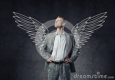 Businessman with wings Stock Photo