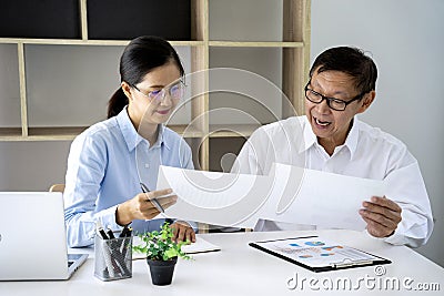 Businessman and woman talking discussing about the job Stock Photo
