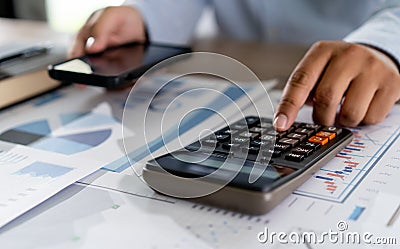 Businessman work math finances and calculate cost invoice for budget to buy home Stock Photo