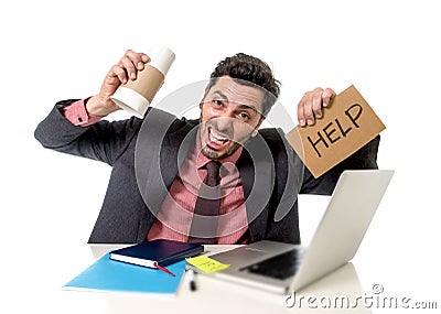 Businessman working on computer asking for help holding empty take away coffee in caffeine addiction Stock Photo