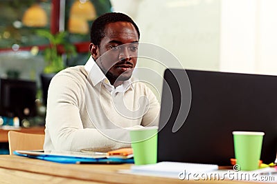 Businessman working on his laptop Stock Photo