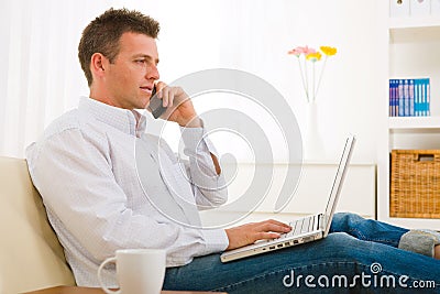 Businessman working at home Stock Photo
