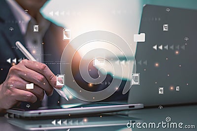Businessman working on laptop computer,online electronic document information database,digital file cloud storage system or Stock Photo