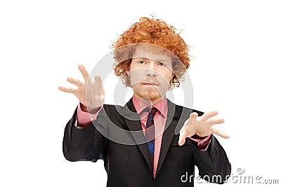 Businessman working with something imaginary Stock Photo