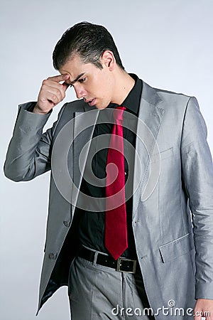 Businessman worried headache stressed and sad Stock Photo