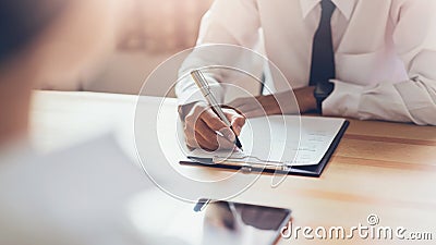 Businessman writing form submit resume employer to review job application. Stock Photo