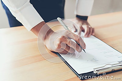 Businessman writing form submit resume employer to review job application. Stock Photo