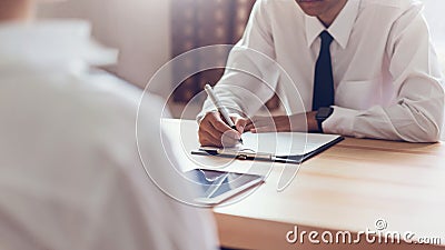 Businessman writing form submit resume employer to review job application. Stock Photo