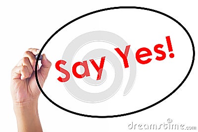 Businessman writing Say Yes word with pen Stock Photo