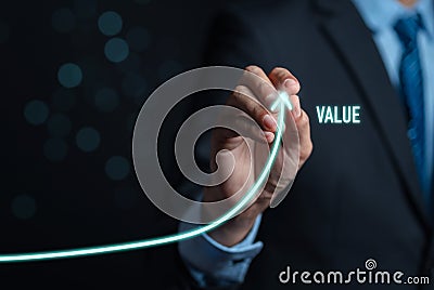 Businessman writing value of money target analyze sales data trading and showing a growing virtual screen of statistics, graph and Stock Photo