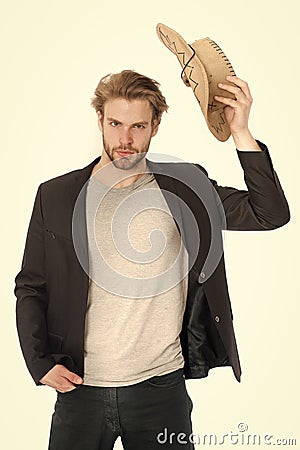 Businessman or young man wearing cowboy hat and black jacket Stock Photo