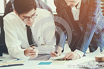 Businessmans partners working with new startup project in office Stock Photo