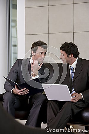 Businessmen discussing strategy Stock Photo