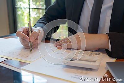 Businessmen, financial accountants, business planners, business planning ideas using computers, laptops, smat phones, and work Stock Photo