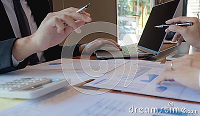 Businessmen, financial accountants, business planners, business planning ideas using computers, laptops, smat phones, and work Stock Photo