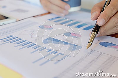 Businessmen, financial accountants, business planners, business planning ideas using computers, laptops, smat phones, and work Stock Photo