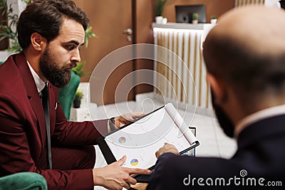 Businessmen forging new alliances Stock Photo