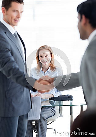 Businessmen greeting each other at a job interview Stock Photo