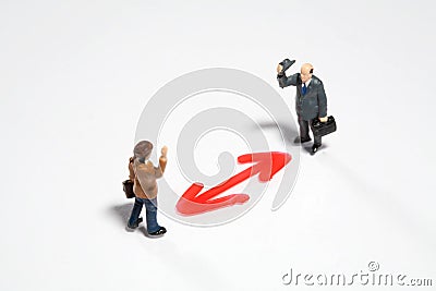 Businessmen greeting over a double-sided triangle Stock Photo
