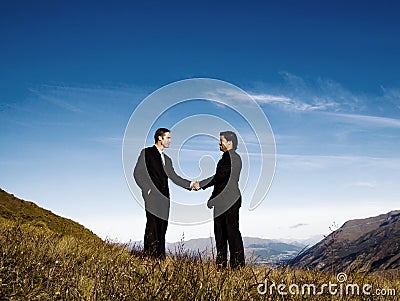 Businessmen Handshake Mountain Range Achievement Concept Stock Photo