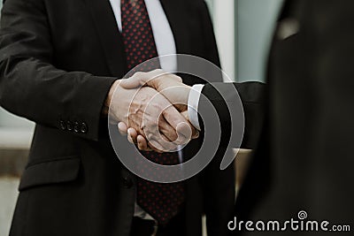 Businessmen making a business deal Stock Photo