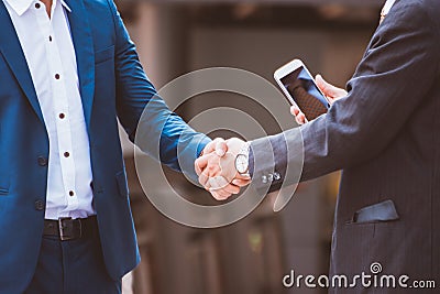 Businessmen making handshake. concept Successful businessmen Stock Photo