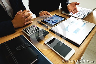 Businessmen present business plans and marketing to the partner Stock Photo