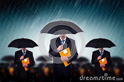 Businessmen in rain Stock Photo