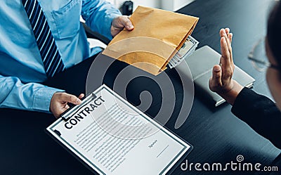 Businessmen refuse to accept money bribery or fraud or cheat, Combating Illegal Receiving of Money and Social Injustice, Anti brib Stock Photo